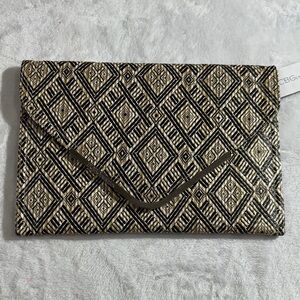 NWT BCBG cream,tan and black woven envelope clutch